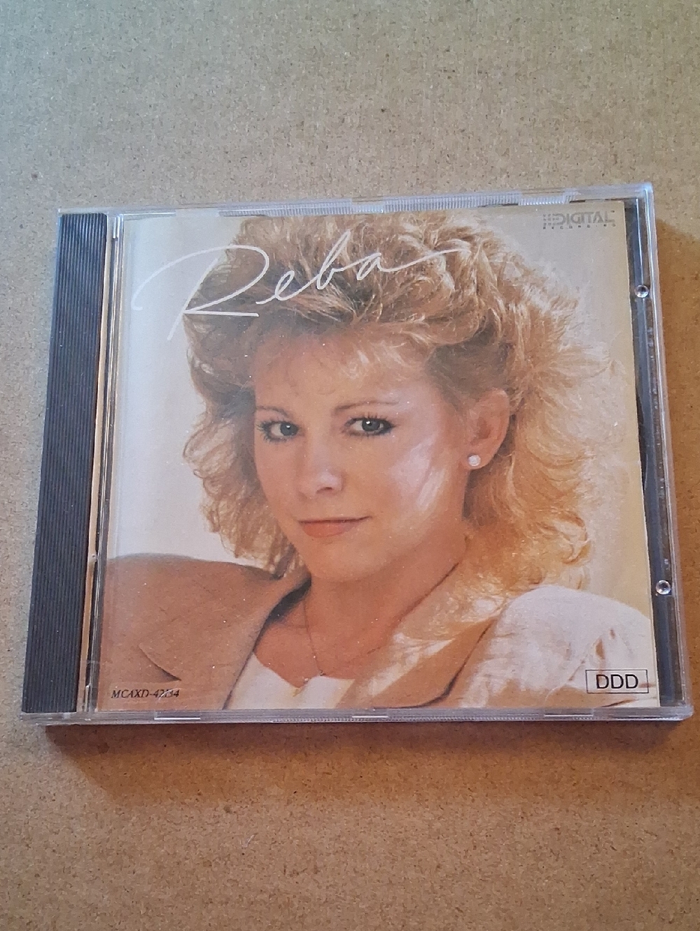 Reba Beige and Cream Portrait CD Cover